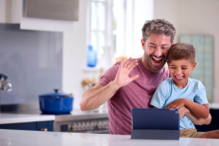 mature-father-at-home-in-kitchen-with-son-making-v-2024-10-19-06-36-58-utc.jpg